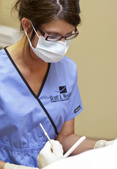 Photo of hygeinist performing safe dental procedure