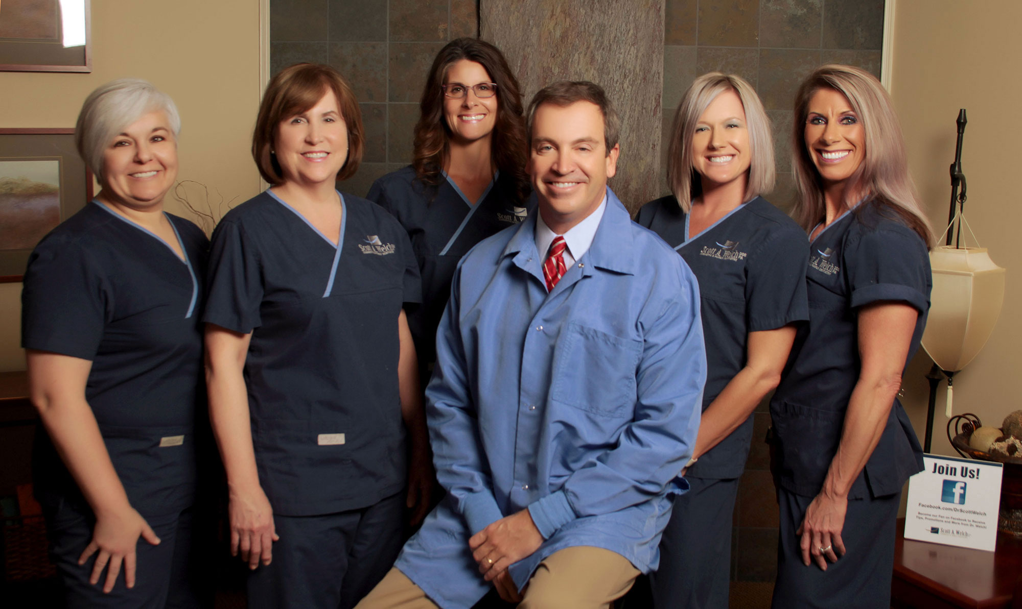 Photo of Dr. Scott Welch and his dental team of hygeinists